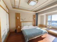 Xinyue Bay Seaview Apartment Hotel (Shibei Bay Dream Water Park Branch)