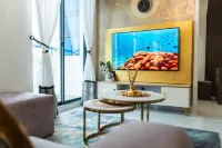 Aina Residency Beachfront Hotel