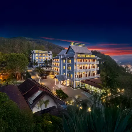 Hillman International Hotel Отели рядом с достопримечательностью «Ват Тат Луанг»