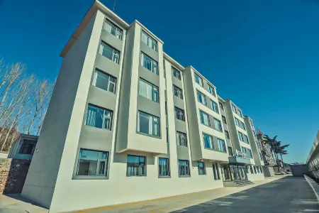 Oriental Guanlan Hotel Отели в г. Жуян