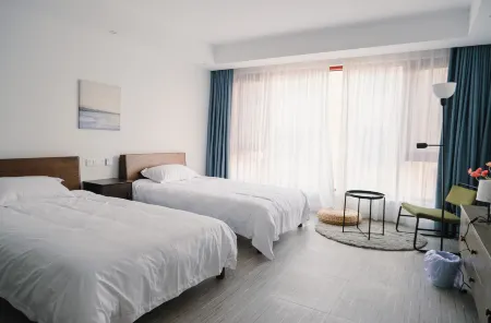 Xinchang Mountain Residence Отели рядом с достопримечательностью «Qianzhang Canyon»