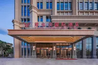 Vienna International Hotel (Haikou Binhai Avenue Xixiu Beach Branch) Hotel berhampiran Haikou Nangang