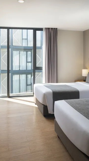 ห้องดีลักซ์เตียงแฝดพร้อมวิวสระว่ายน้ำ