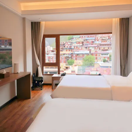 Minshan Xingzhe Muxin Wangqinda Hotel (Dege Yinjing Yuan Branch)