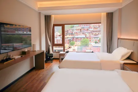 Minshan Xingzhe Muxin Wangqinda Hotel (Dege Yinjing Yuan Branch)