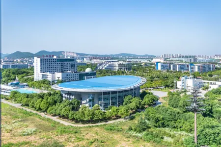 Manmanzhu Movie Apartment Отели рядом с достопримечательностью «Jiangsu Maritime Institute (Jiangning Campus)»