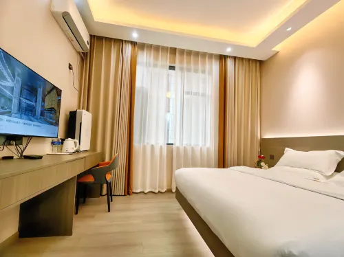 Mile Muxi Hotel (Huquanshui Township Tourism Resort)