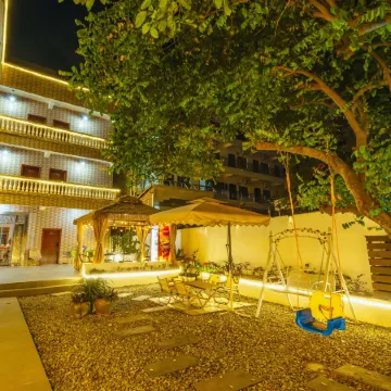 Weizhou Island Huajingli · Seaside Guest House (Dishui Danping Shop) Отели рядом с достопримечательностью «Moon Square»