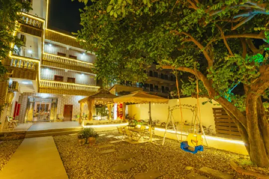 Weizhou Island Huajingli · Seaside Guest House (Dishui Danping Shop) Отели рядом с достопримечательностью «Great Palace»