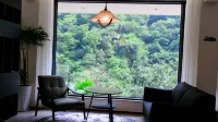 โรงแรมรีสอร์ทผู่เจียน - ที่มีบาร์