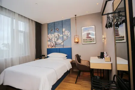 Magnolia Hotel (Yantai Penglai Railway Station) Отели рядом с достопримечательностью «Haishi Park»