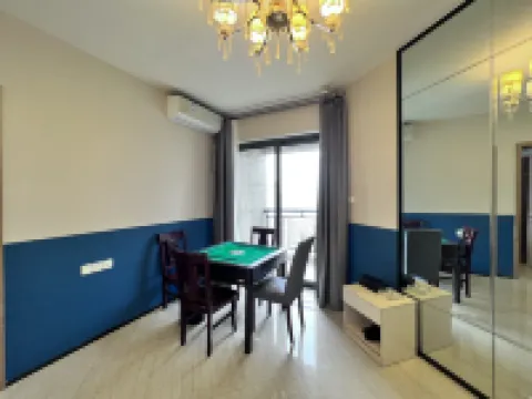 May Boutique Hotel (Xinyang East Railway Station Evergrande Plaza)