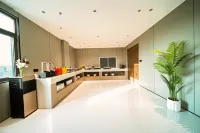 Home Inn UP Huayi Collection Hotel (Linyi City Vocational College)