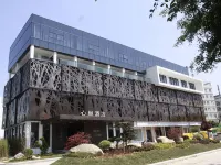 Xin Nest Hotel (Wenzhou Sanyang Wetland) 温州文化商品市场-C棟周辺のホテル