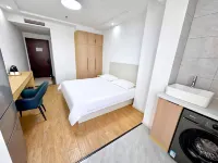 Nantong Yongchen Apartment Hotel - Balcony
