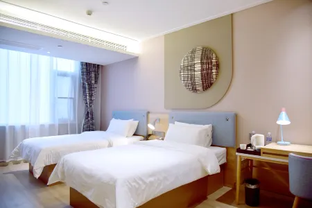 Home Inn Neo (Zhoukou Xihua Qinghua Road Branch) Отели рядом с достопримечательностью «Jizi Reading Platform»