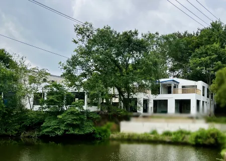 Mulan Taoyuanju (Mulan Mountain Scenic Area) Отели рядом с достопримечательностью «Hubei Ming and Qing Dynasties Ancient Architecture Museum»