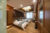 Shengyuan Grand Hotel Hotels near Rehuitang Town