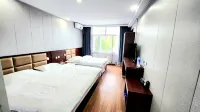 Huma Guoxin Hotel