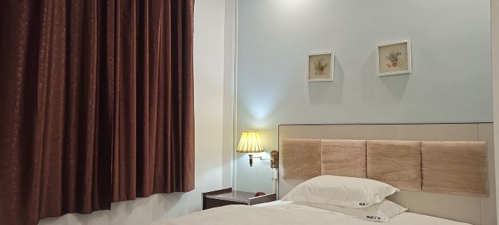 Hechi Yucheng Apartment Hotéis em Hechi