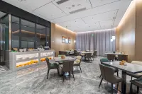 Yiliang Fei'er Lisi Hotel - servizio colazione