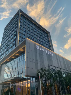 DeXin JunTing Hotel (Wenzhou South Railway Station Yintai Department Store Branch)