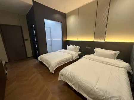 Yishui HongRi Business Hotel Отели рядом с достопримечательностью «Heavenly Kingdom Scenic Area»