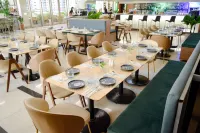 馬尼拉中央温德姆華美達酒店 - 早餐