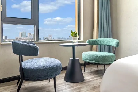 Hua En Boutique Hotel Отели рядом с достопримечательностью «Xianghe Square»