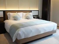 Xinzhi Hotel Hotel berhampiran Jambatan Daqing