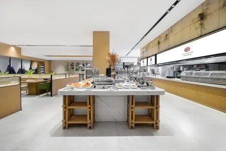 Huaxi Hotel Daqing Отели рядом с достопримечательностью «Daqing Times Square»