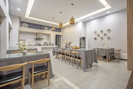 Muhe Hotel Отели рядом с Аэропорт Ваньчжоу