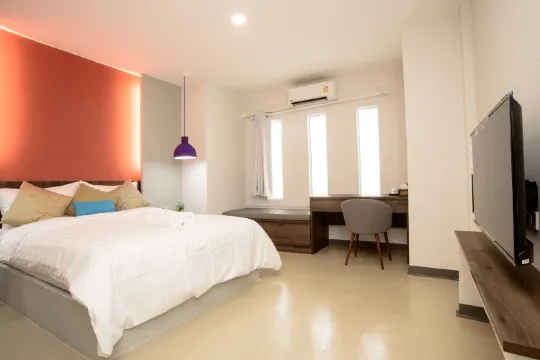 ห้องดีลักซ์ เตียงใหญ่ 1 เตียง