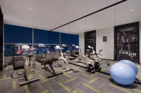 โรงแรมแมนซี (สาขา เขตพัฒนาเศรษฐกิจผิงหู เมืองเสื้อผ้าจีน)