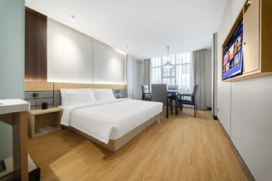 Manzhou Hotel (Pingjiang Bus Station Outlet)