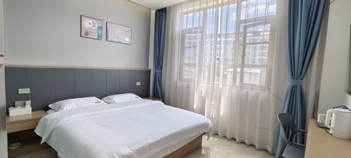 Chunguang Boutique Hotel (Jinhui Commercial City) Hotele w: Powiat Luliang