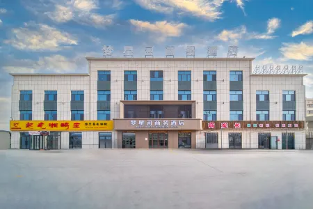 Luntai Mengxinghe Business Hotel (Xiyu Community Xincheng Road)
