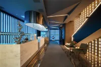 Gwen E-sports Hotel (Shuanggang Railway Station)
