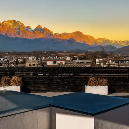 Experience the breathtaking panorama of snow-capped mountains in a luxurious villa.