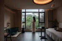 qianhuan.redhouseshejishidujiabieshu(xiaoqikongdongmenshoupiaodatingdian)