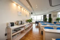 Huahai Holiday Hotel - Frühstück