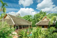 Xishuangbanna Jinghong Yunjian Qixin Rainforest Holiday VILLA Hotels near The Great Pagoda Temple of Jinghong