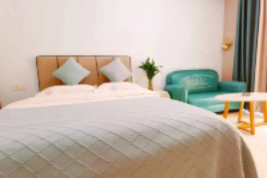 Xiaoqiu Happy Apartment โรงแรมในInternational Exhibition Center/Wanxiang Mall