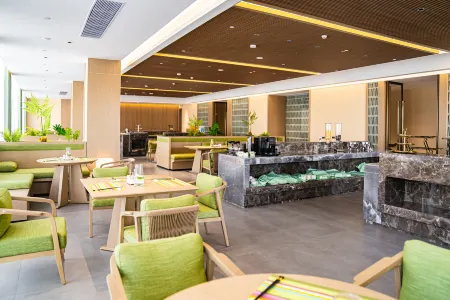 Xialian Hotel (Guangxi Dongrong Stone Calcium Carbonate Trading Center) Отели рядом со станцией Hezhou Railway Station