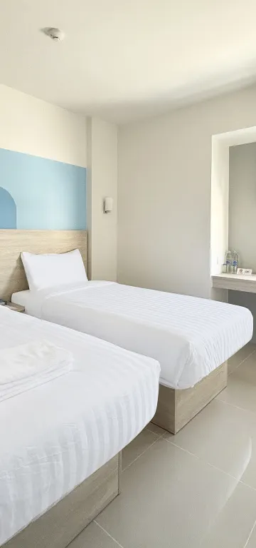 ห้องมาตรฐานเตียงแฝดพร้อมระเบียง