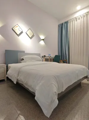 茂名泊愉青年公寓 鄰近石金錢龜的酒店