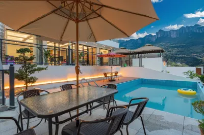 Enshi Xingtian Jiayuan Homestay (Yunlong Ground Fissure Store, Grand Canyon Scenic Area) 레인보우 폭포 주변 호텔