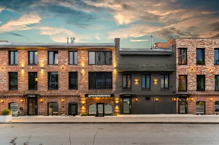 Бутик-Апарт Николаев Билдинг Отели рядом с достопримечательностью «выстрелка о времени»