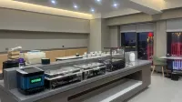 โรงแรมโมเจียอิมเพรสชั่น (มหาวิทยาลัยเมืองเป่าหลง) - พร้อมอาหารเช้า