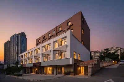 Zhu Meiyinxiang Apartment (Qingdao May Fourth Square Kaohsiung Road Metro Station) Hotel in zona Qingdao Administrative Institute